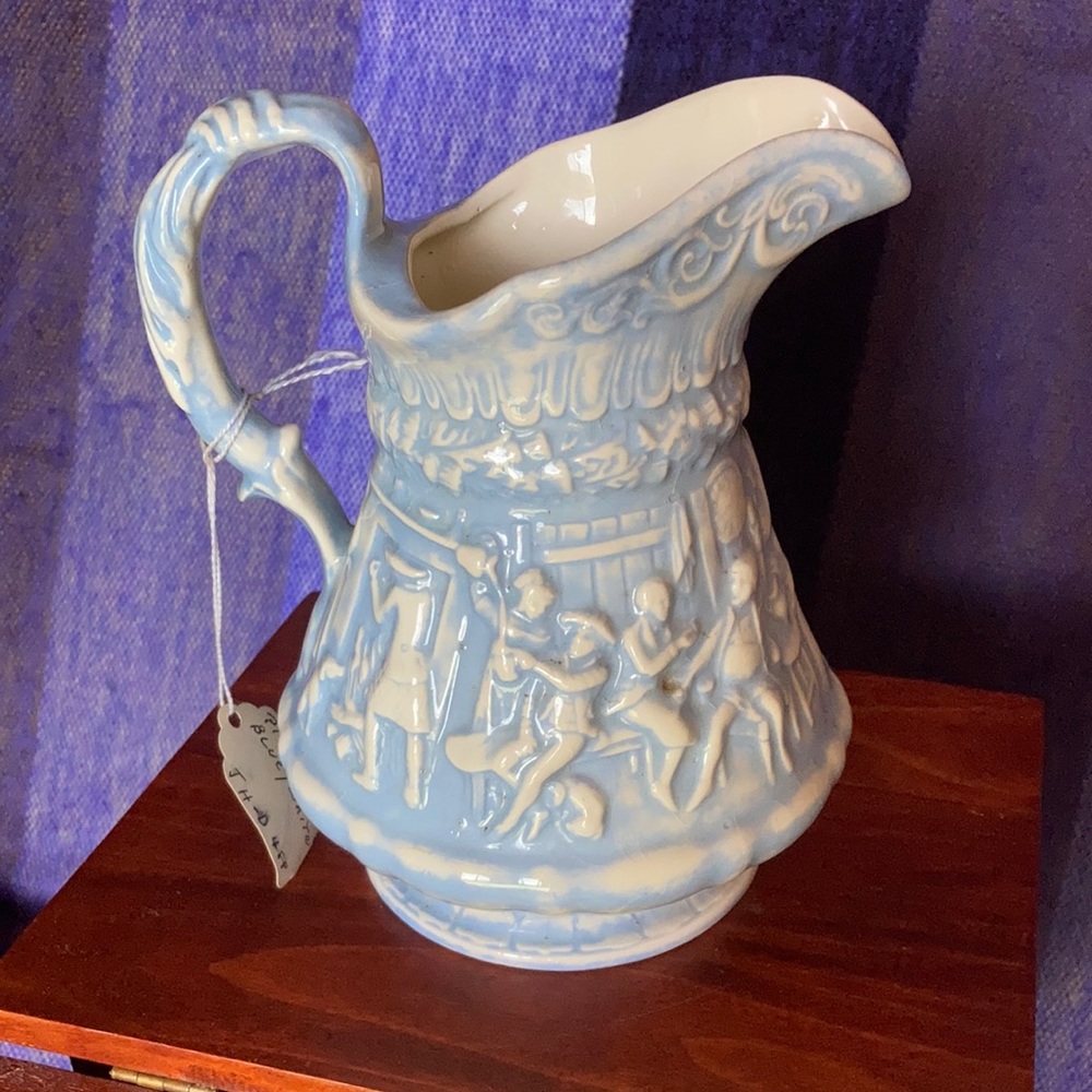 Vintage blue and white ceramic pitcher